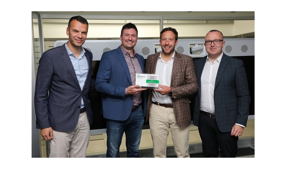 Igor Babić, Managing Director, Hewlett Packard Enterprise operated by Selectium presents the certification award to Dušan Milićević, General Manager of Comtrade System Integration. (Left to right: Marko Bratić, Igor Babić, Dušan Milićević, Zdravko Drčelić) Photo credit: Hewlett Packard Enterprise operated by Selectium