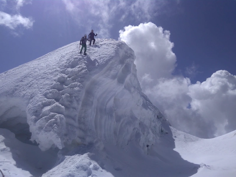 Maxime and team will take five days to trek to Basecamp, then attempt the ascent carefully on skis. Maxime conquers a peak on skis. The back-country skis will be equipped with seal skins and crampons to be able to allow a safe and effective ascent