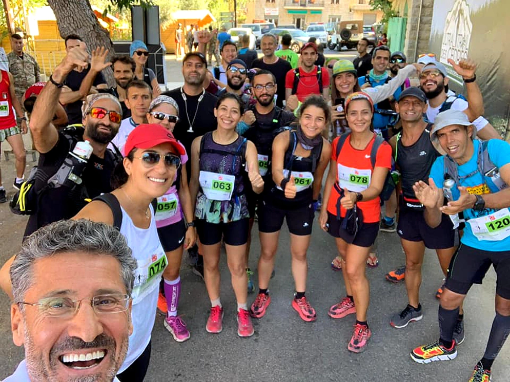 Maxime Chaya and runners at the finishing line - many competed from all over the world Photo credit: UTC and Maxime Chaya