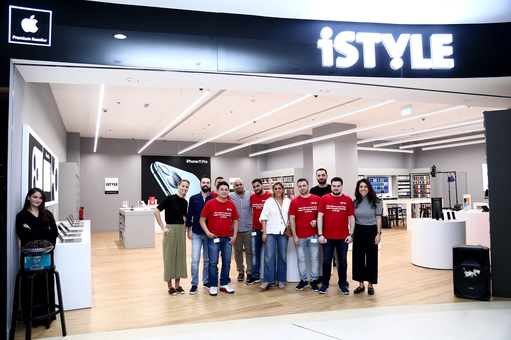 The iSTYLE team enjoying the new store Photo credit: iSTYLE