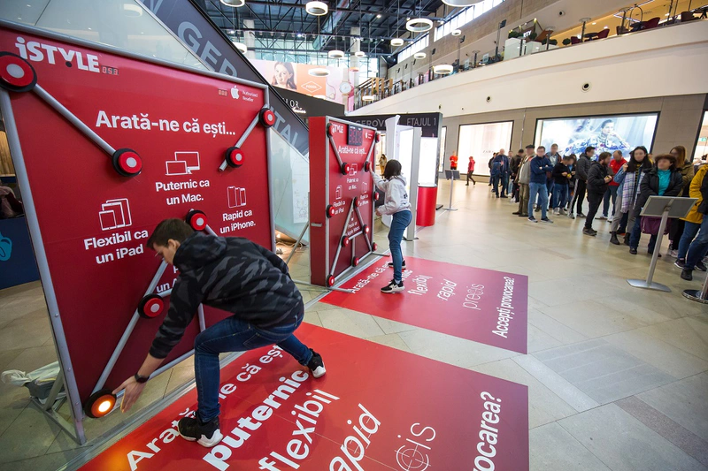 Fun and games at the opening while keen Apple fans queue to visit the new store. Photo credit - iSTYLE