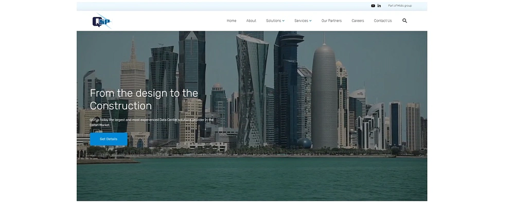 website homepage with a cityscape background