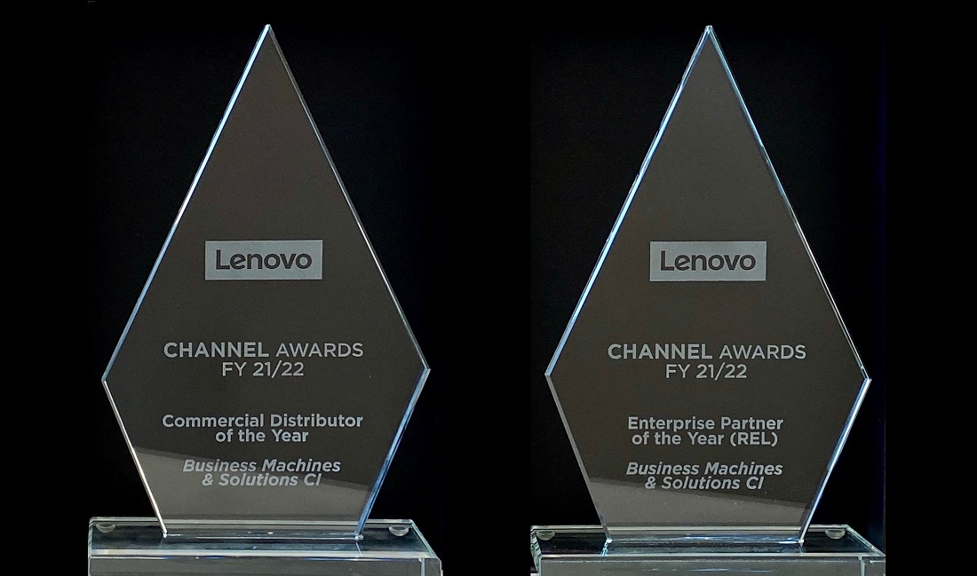 two glass awards side by side against a black background