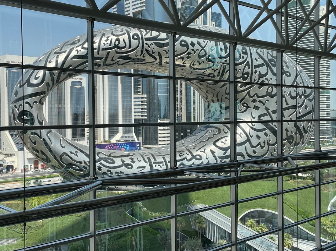 a striking view looking out at the Museum of the Future through a large window