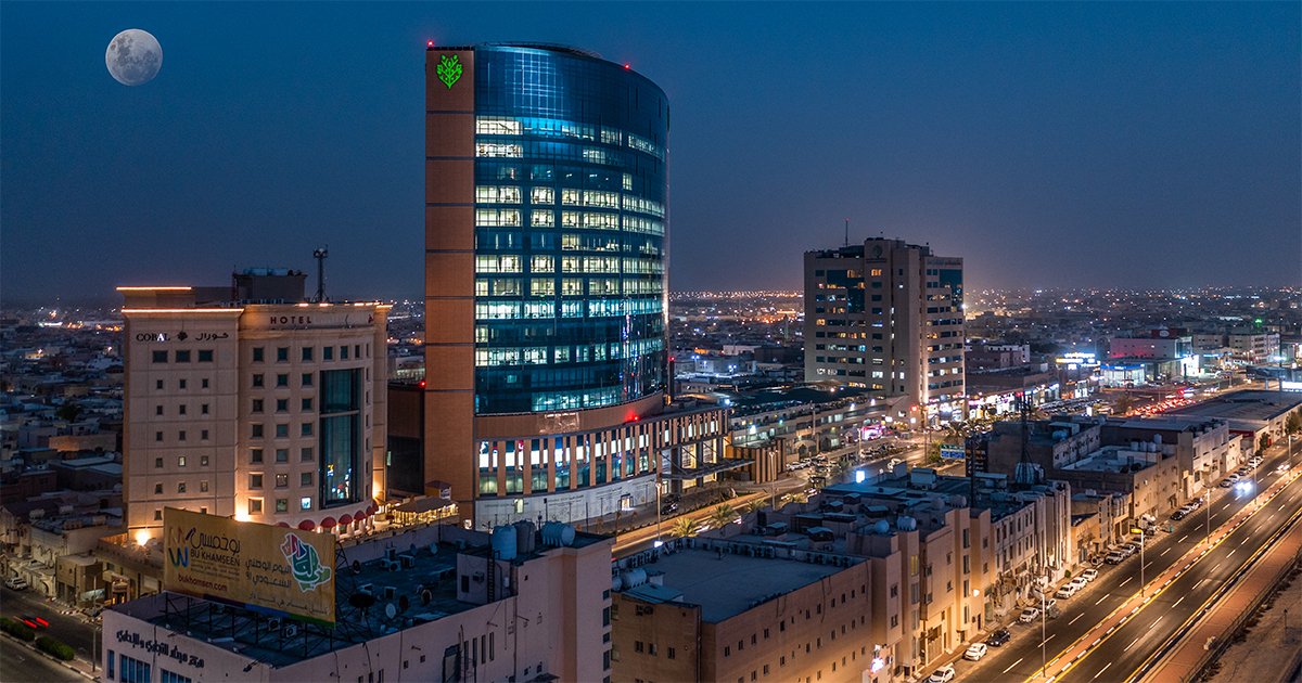 Night time view of a modern hospital building