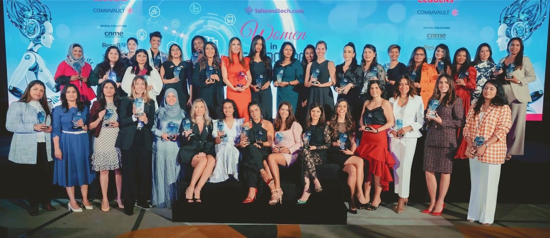 a large group photograph of women who are all award winners