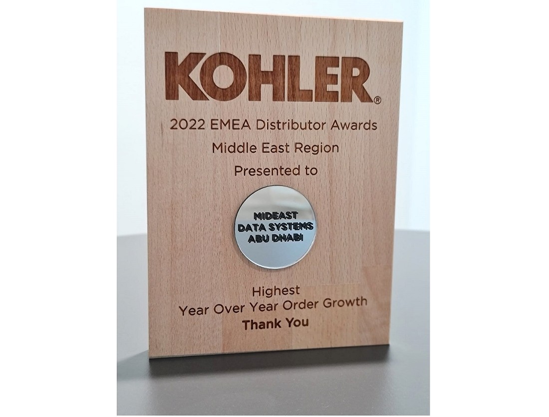 an award trophy made from laser engraved wood