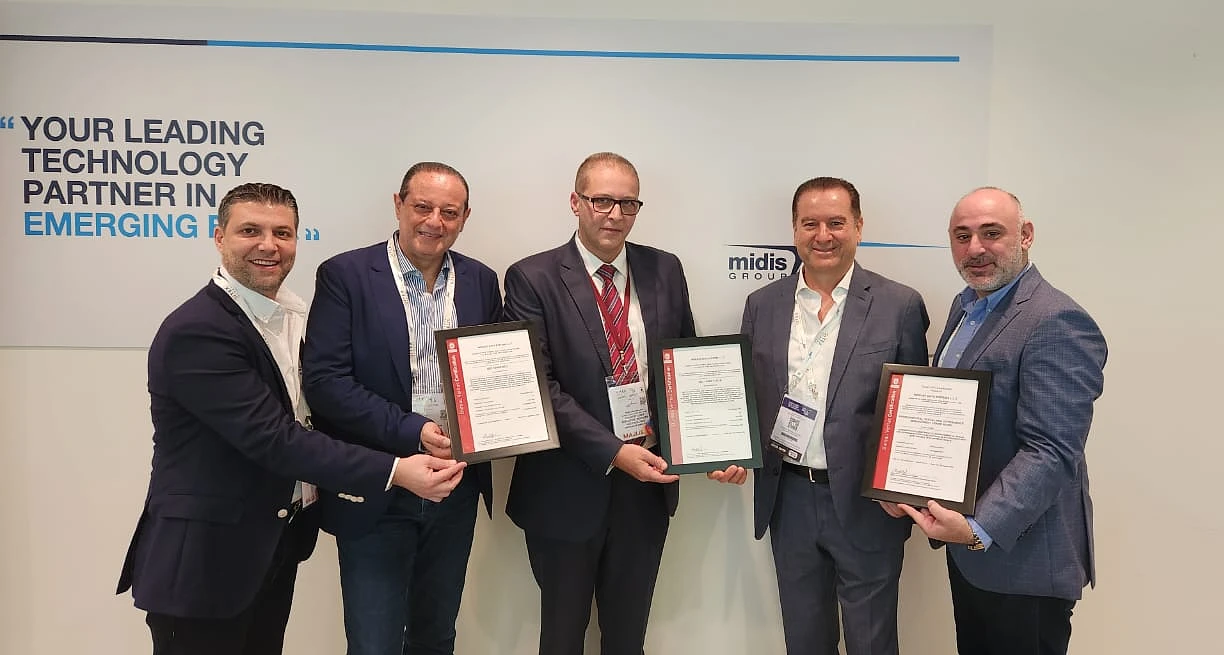 five men seen together in a group photo holding certificates