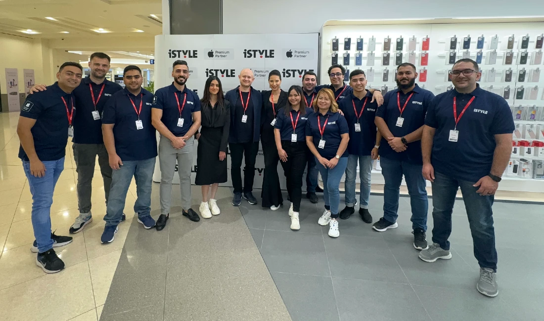 Group photo of a team of people from a hi tech store