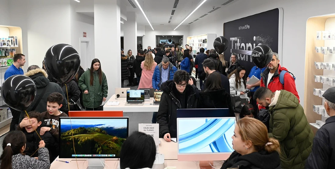 a busy scene inside a hi tech store