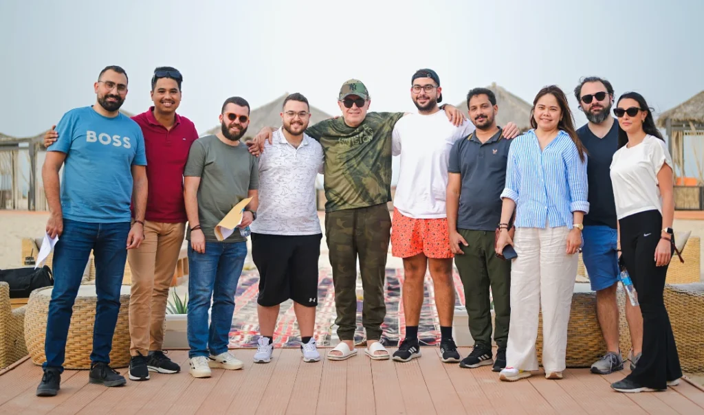 ten people seen together in an informal group photograph