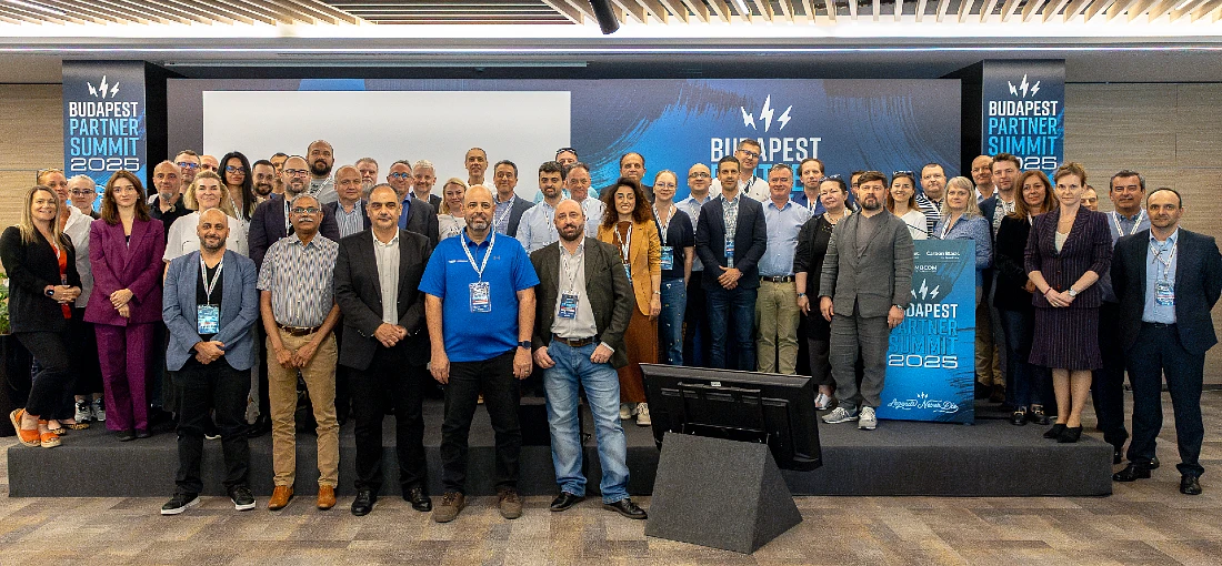 A group photo of people at a hi tech conference
