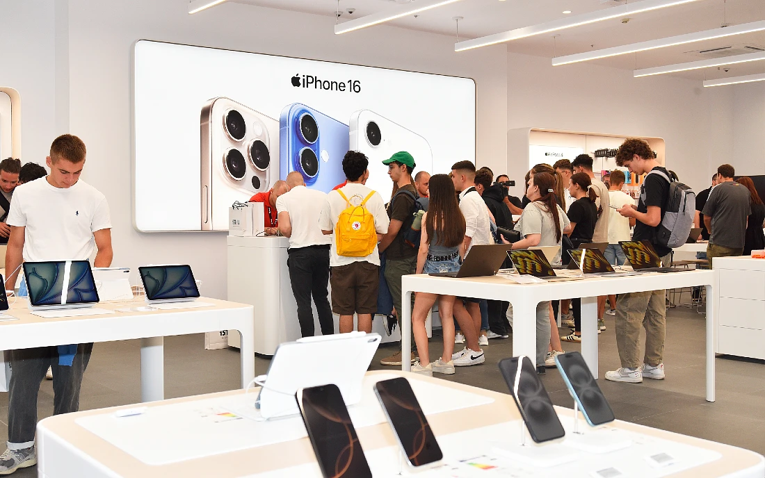 people crowd around a help desk at iSTYLE Sofia 
