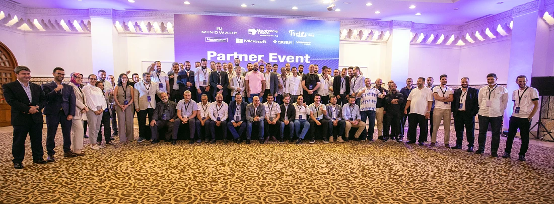 A group photo of an aseemblage of people at a hi tech event