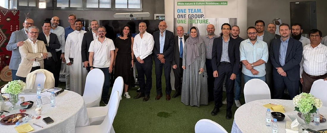 A group photograph of a gathering of leaders and managers