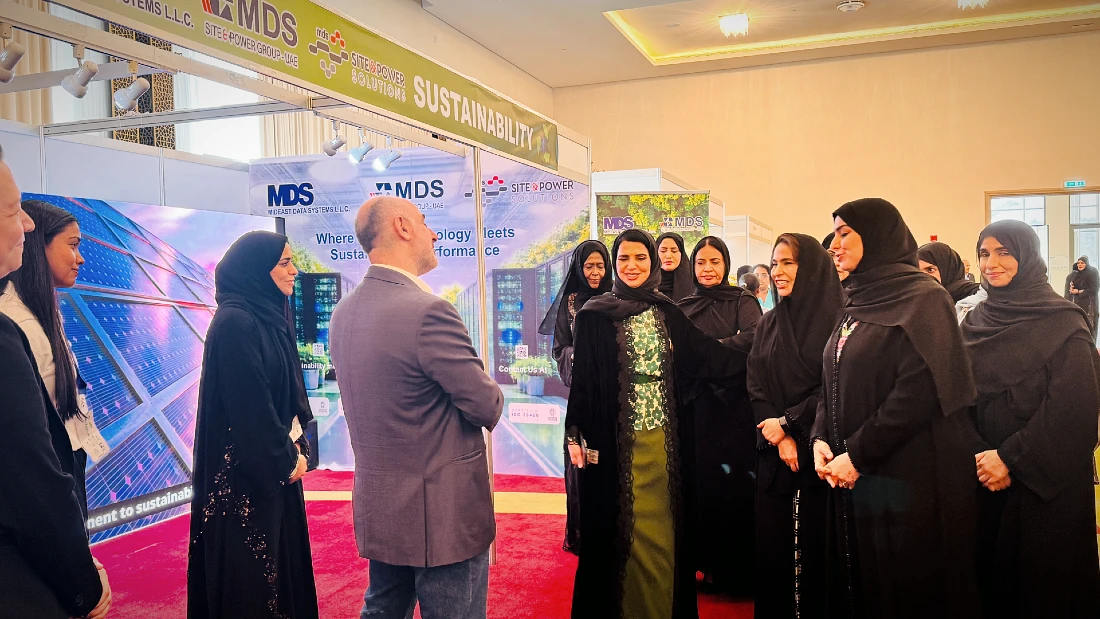Eleven of the MDS team greet dignitaries at the company booth at Eco Expo