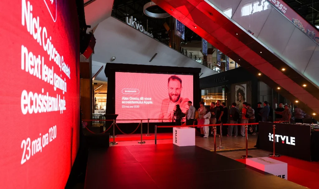Grand opening of a hi tech store with people queuing to get into the new site