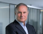 small thumbnail image of a man in a suit
