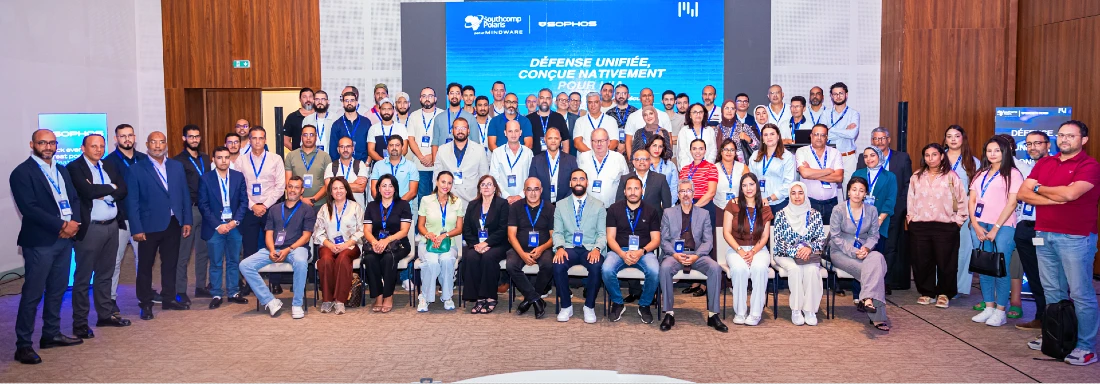 A group photo of a large number of people at a hi tech event